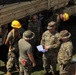 USACE District Commander joins 797 Engineering Company on RISEUP temporary roof construction