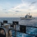 USS Ronald Reagan (CVN 76) conducts fueling-at-sea with USS Antietam (CG 54)