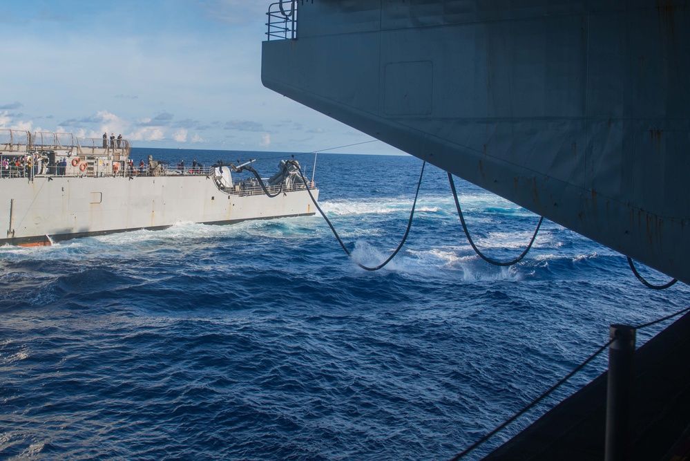 USS Ronald Reagan (CVN 76) conducts fueling-at-sea with USS Antietam (CG 54)