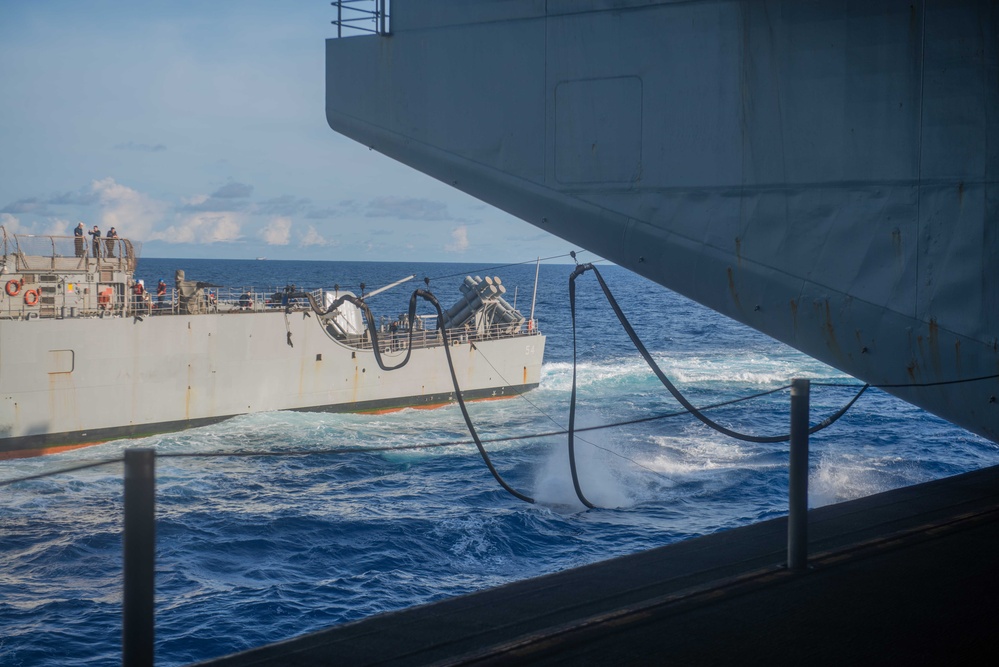 USS Ronald Reagan (CVN 76) conducts fueling-at-sea with USS Antietam (CG 54)