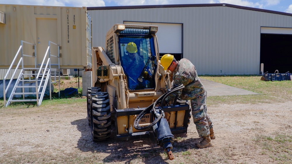 215th EN Co Supports Camp Santiago by Building Fences