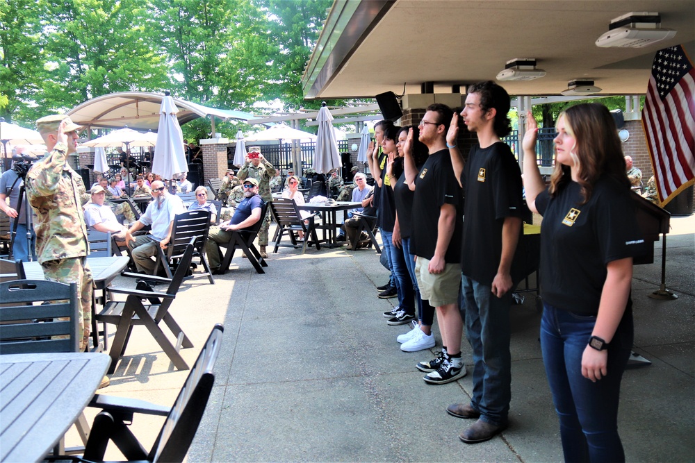 Fort McCoy Garrison commander gives oath of enlistment to new recruits during 2023 Army Birthday Celebration