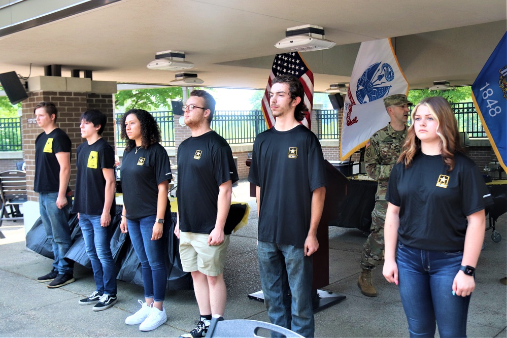 Fort McCoy Garrison commander gives oath of enlistment to new recruits during 2023 Army Birthday Celebration