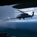 USMC KC130J Hercules refuels 33rd RQS HH60 Pave Hawks