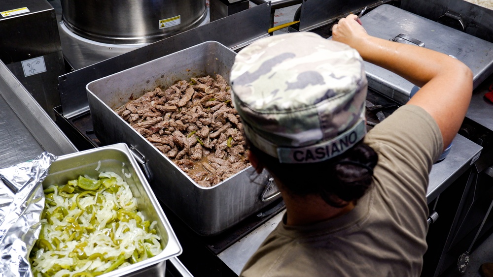 U.S. Army Cooks of the 192nd QFFP make dinner