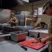 U.S. Army Cooks of the 192nd QFFP make dinner