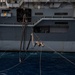 USS Rafael Peralta (DDG 115) conducts a replenishment-at-sea with the Nimitz-class nuclear-powered aircraft carrier USS Ronald Reagan (CVN 76)