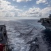 USS Rafael Peralta (DDG 115) conducts a replenishment-at-sea with the Nimitz-class nuclear-powered aircraft carrier USS Ronald Reagan (CVN 76)