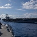 USS Rafael Peralta (DDG 115) conducts a replenishment-at-sea with the Nimitz-class nuclear-powered aircraft carrier USS Ronald Reagan (CVN 76)