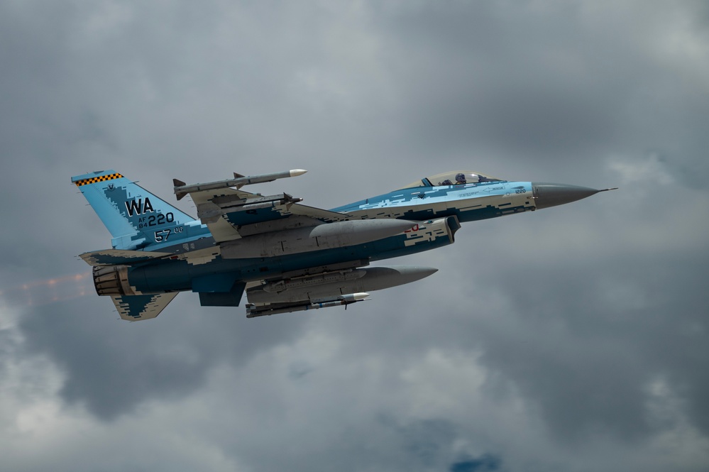 Nellis AFB take offs 422nd TES and 64th Aggressor