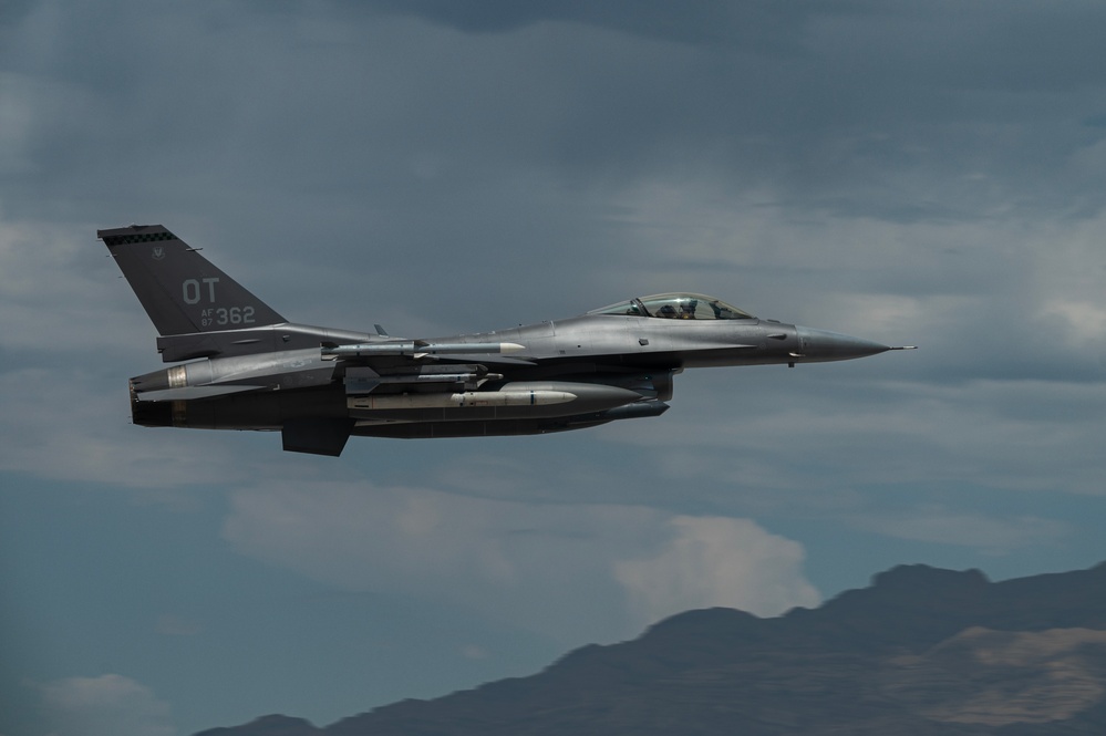 Nellis AFB take offs 422nd TES and 64th Aggressor