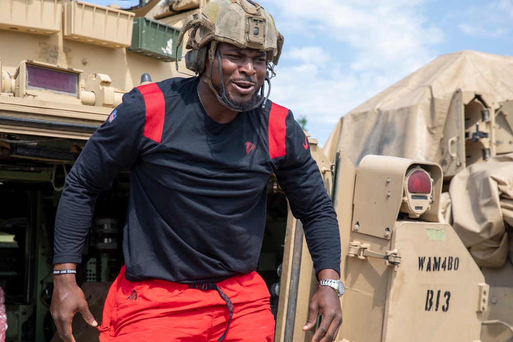 Players from the Atlanta Falcons visit Soldiers in Romania