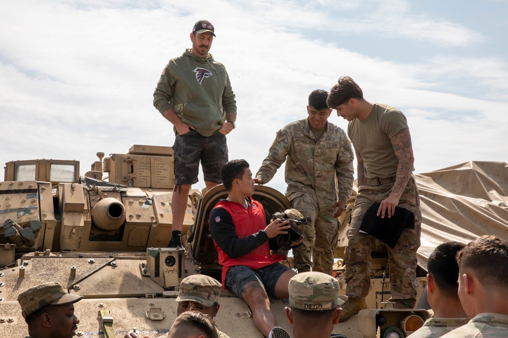 Players from the Atlanta Falcons visit Soldiers in Romania