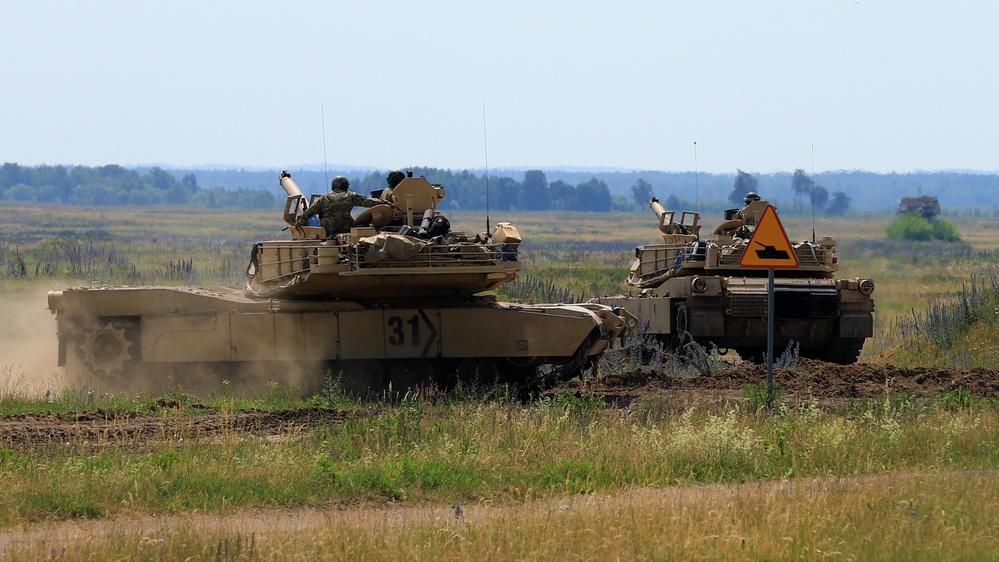 1st Cavalry Division’s 2nd Armored Brigade Abrams tanks conduct live-fire exercise at Bemowo Piskie Training Area, Poland