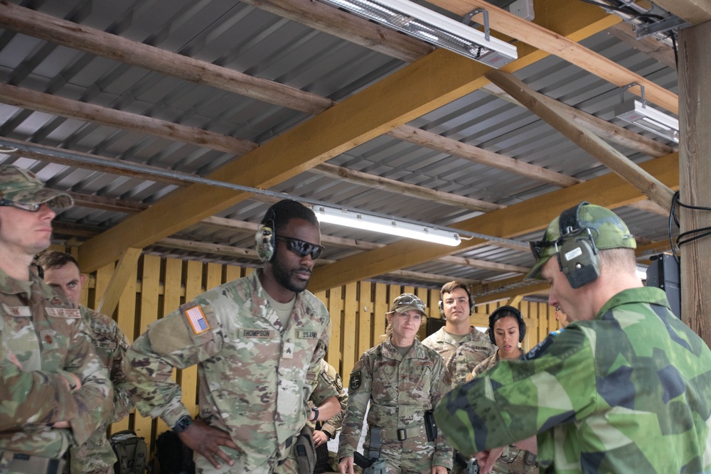 U.S. Army and Air Force Reserve service members receive range safety guidance