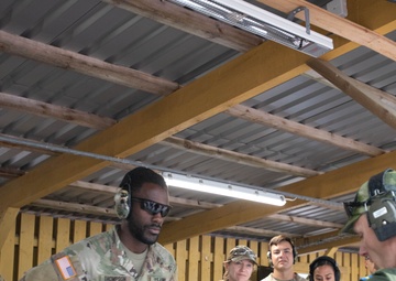U.S. Army and Air Force Reserve service members receive range safety guidance