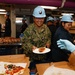 Abraham Lincoln hosts pizza party for on duty Sailors