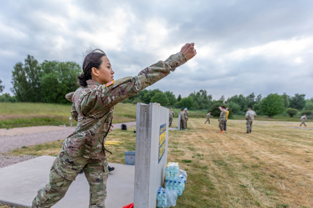 Army Reserve Sgt. Christine Won practices grenade throwing