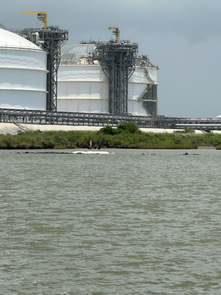 Coast Guard assists 2 men, 1 dog after boat capsizes near Sabine Pass, Texas