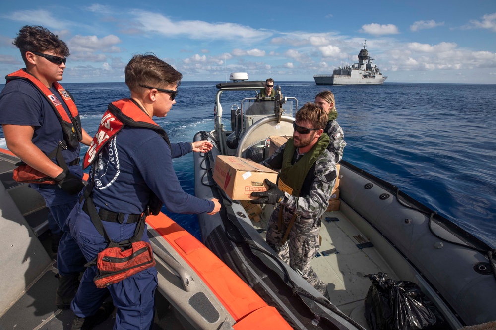 U.S. Coast Guard Cutter Stratton Conducts Receives Stores from Australian Navy Ship