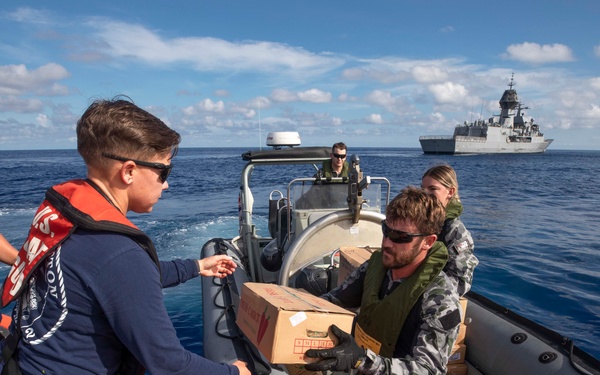 U.S. Coast Guard Cutter Stratton Conducts Receives Stores from Australian Navy Ship