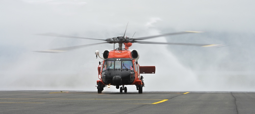 Coast Guard Air Station Kodiak commanding officer receives water salute