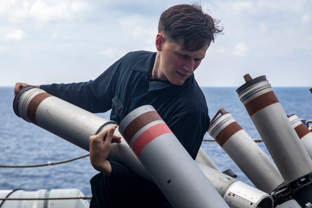 Sailors Aboard USS John Finn (DDG 113) Conduct Ammo Upload