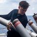 Sailors Aboard USS John Finn (DDG 113) Conduct Ammo Upload