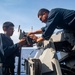 Sailors Aboard USS John Finn (DDG 113) Conduct Ammo Upload