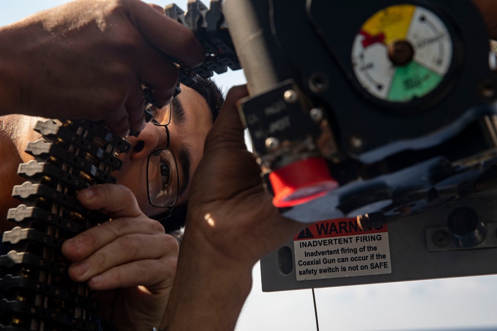 Sailors Aboard USS John Finn (DDG 113) Conduct Ammo Upload