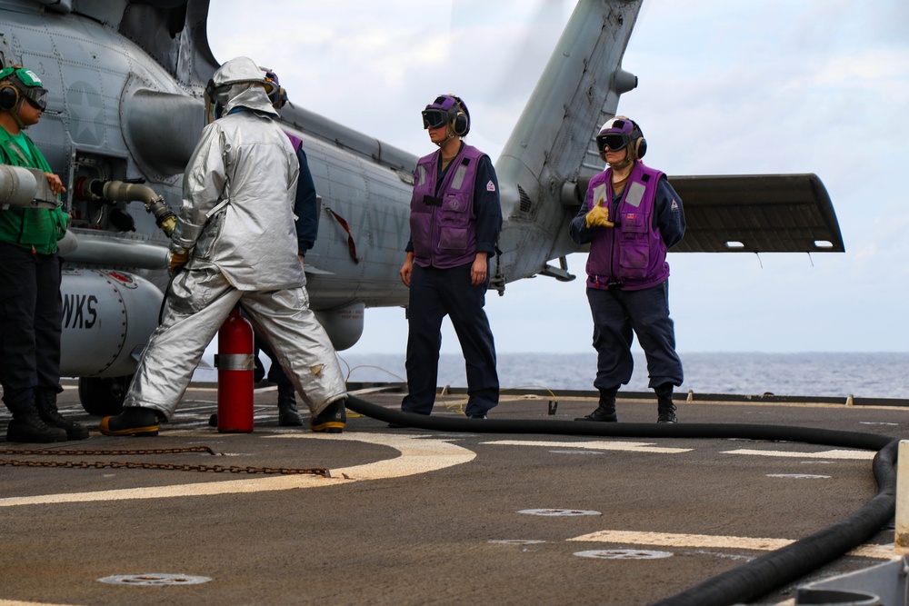 Dvids - Images - Uss Robert Smalls (cg 62) Sailor Signals During Hot 