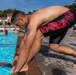 Army Reserve Staff Sgt. James Lavoie dives into a pool