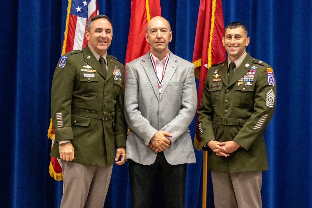 10th Mountain Division and Fort Drum award inductees into the Warrior Legend Hall of Fame and Man/Woman of the Mountain