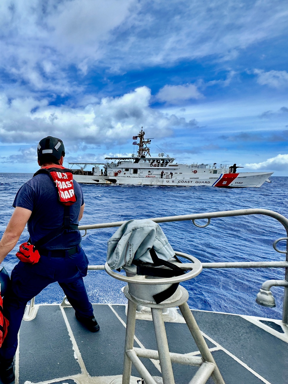 U.S. Coast Guard Station Apra Harbor crew picks up passengers from USCGC Oliver Henry