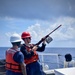 USCGC Oliver Henry (WPC 1140) crew practice using a line throwing gun