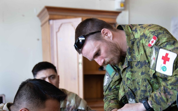 Effects and enablers team create real-world training during Global Medic exercise.