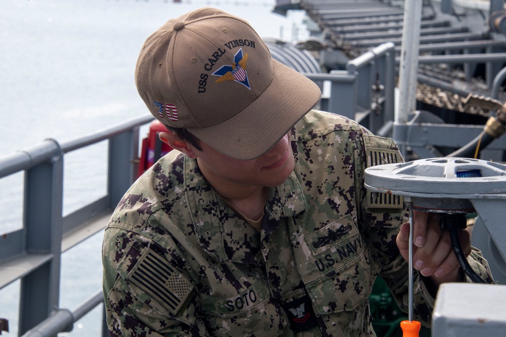 USS Carl Vinson (CVN 70) Sailors Work on the Flight Deck