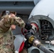 U.S. Airmen refuel an A-10 Thunderbolt from a C-130 Hercules