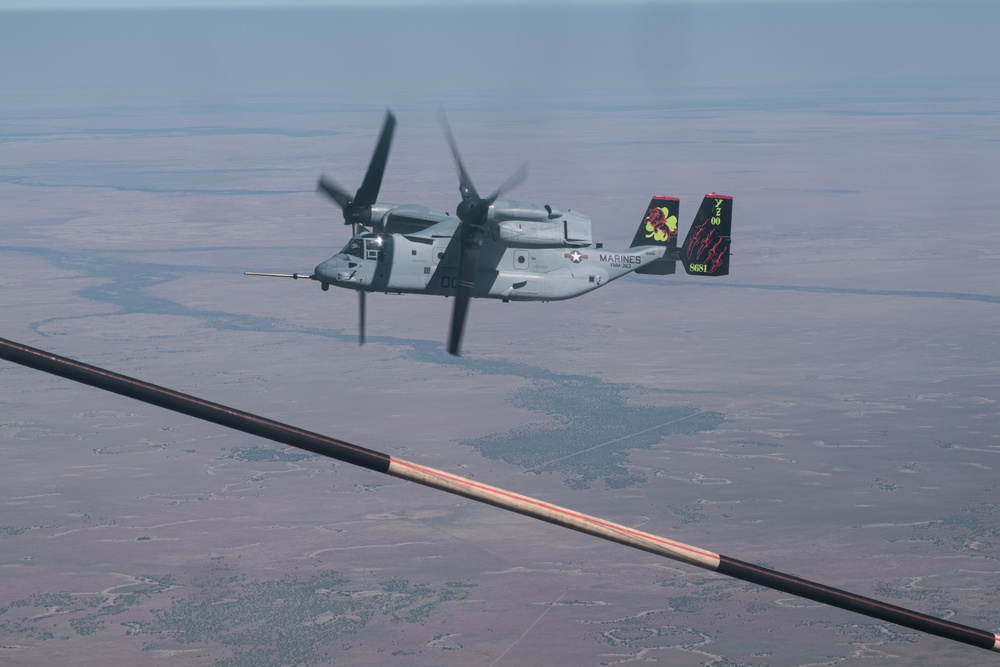 KC-130 J Hercules refuels MV-22B Osprey tiltrotor aircraft