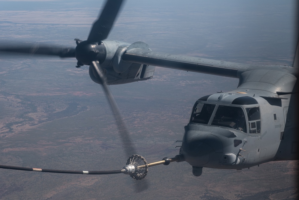 KC-130 J Hercules refuels MV-22B Osprey tiltrotor aircraft