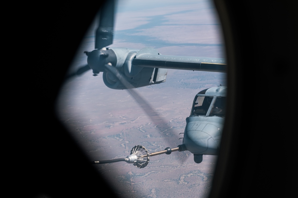 KC-130 J Hercules refuels MRF-D MV-22B Osprey tiltrotor aircraft