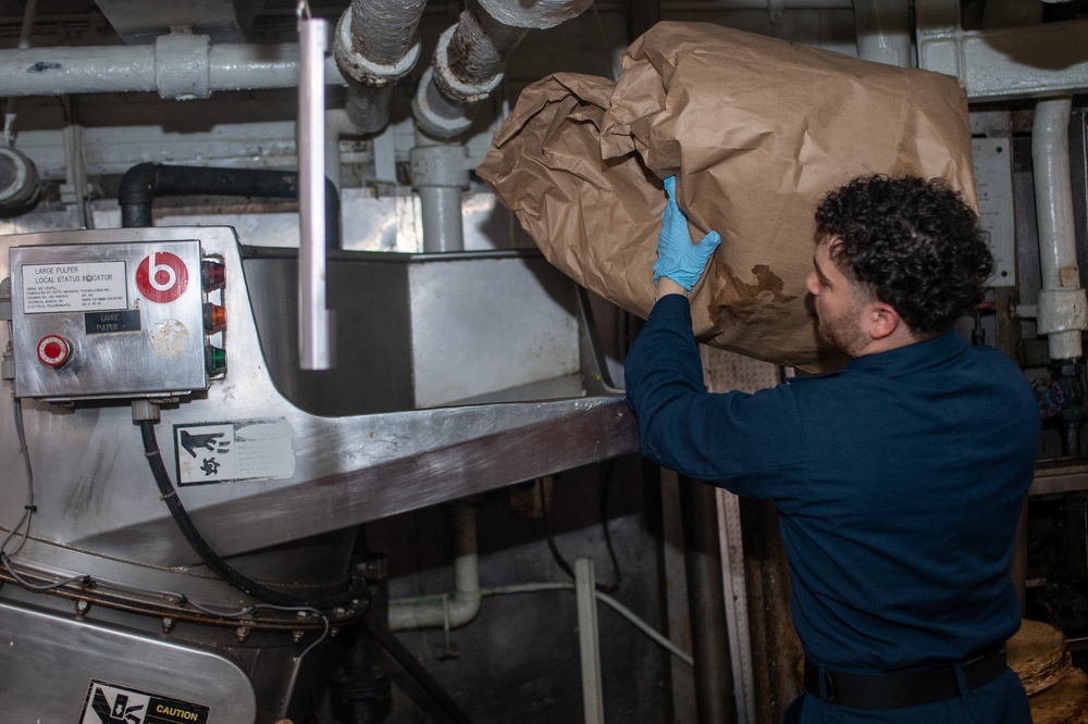 USS Ronald Reagan (CVN 76) Sailors process waste