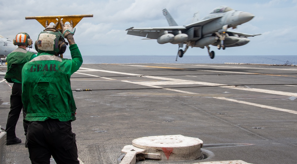 USS Ronald Reagan (CVN 76) Sailors conduct flight operations