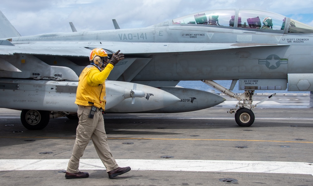 USS Ronald Reagan (CVN 76) Sailors conduct flight operations