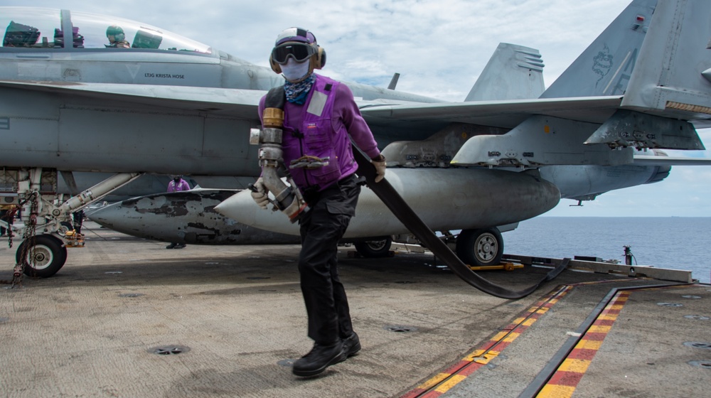 USS Ronald Reagan (CVN 76) Sailors conduct flight operations