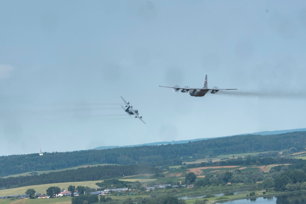 Two U.S. Air Force C-130 Hercules aircrafts perform tactical maneuvers at exercise Air Defender 2023