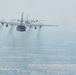 Two U.S. Air Force C-130 Hercules aircrafts perform tactical maneuvers at exercise Air Defender 2023
