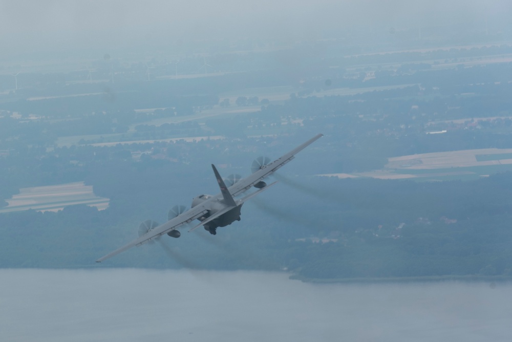 A U.S. Air Force C-130 Hercules aircrafts performs tactical maneuvers at exercise Air Defender 2023