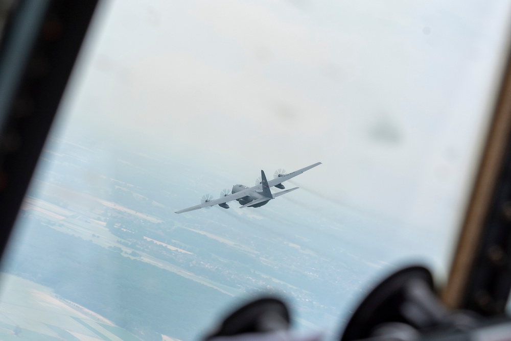 A U.S. Air Force C-130 Hercules aircrafts performs tactical maneuvers at exercise Air Defender 2023