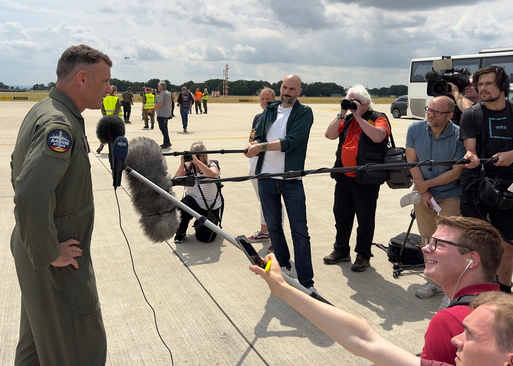 U.S. Air Force Col. Rusty Ballard speaks with members of the German media